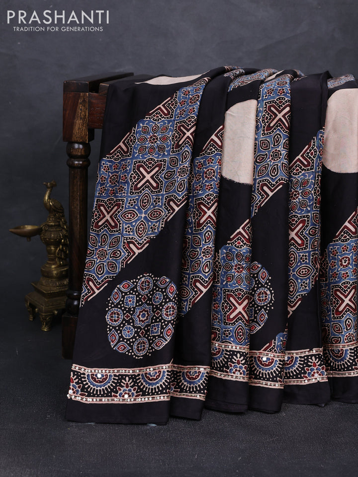Modal silk saree black with ajrakh prints and mirror & sequin embroidery pallu
