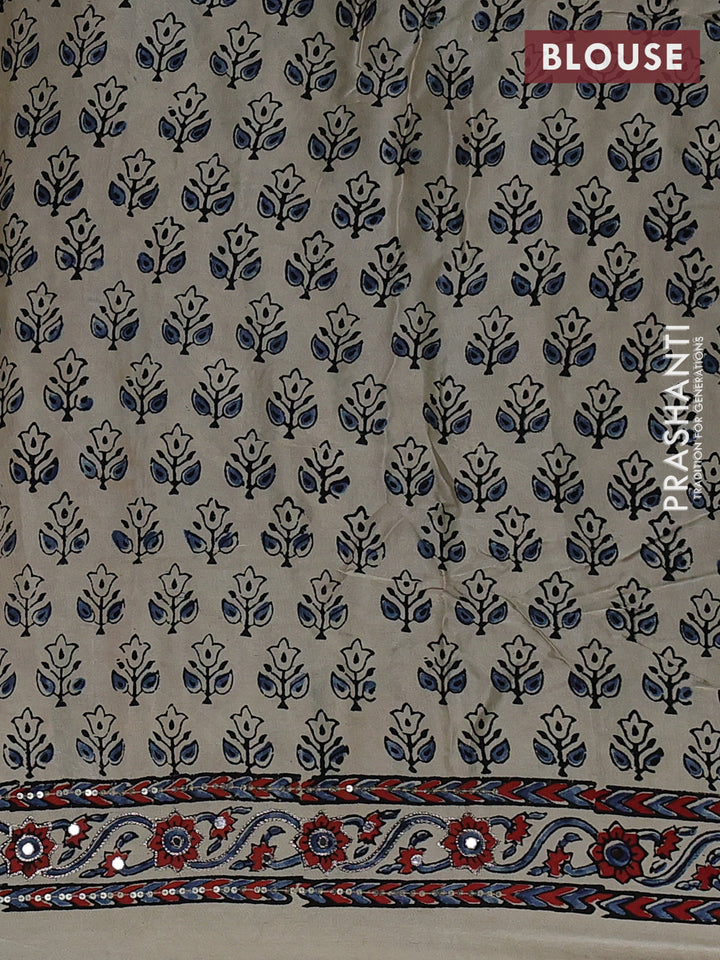 Modal silk saree cream with allover ajrakh prints and mirror & sequin embroidery pallu