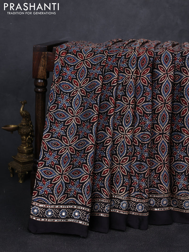 Modal silk saree black with allover ajrakh prints and mirror & sequin embroidery pallu