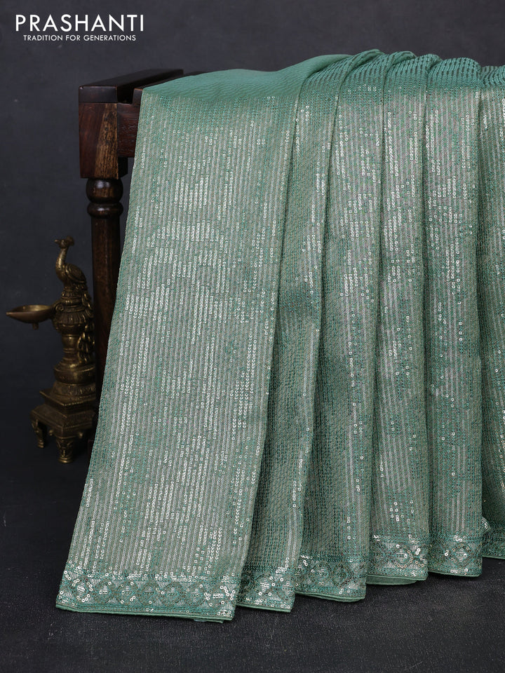 Organza Saree teal green with allover sequin embroidery work