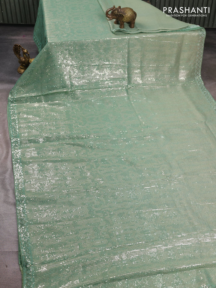 Organza Saree teal green with allover sequin embroidery work