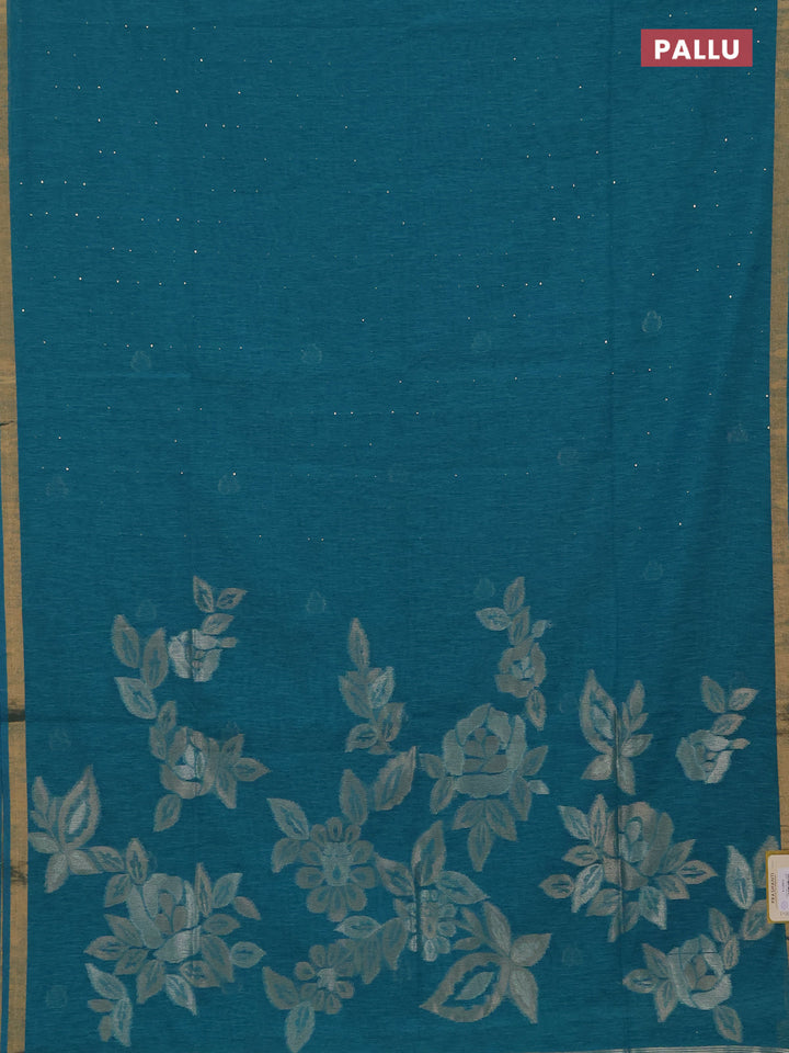 Jute silk saree teal blue with allover sequin work and zari woven border