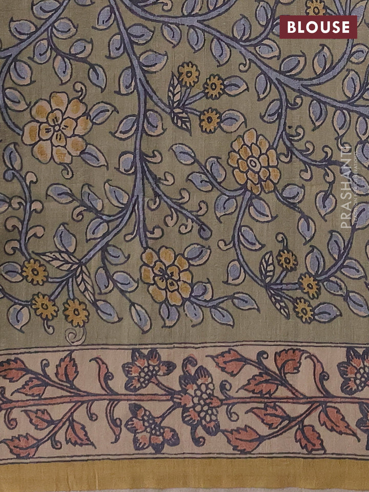 Matka tussar saree grey and elaichi green with allover ajrakh prints & mirror work and kalamkari prints & embroidery pallu