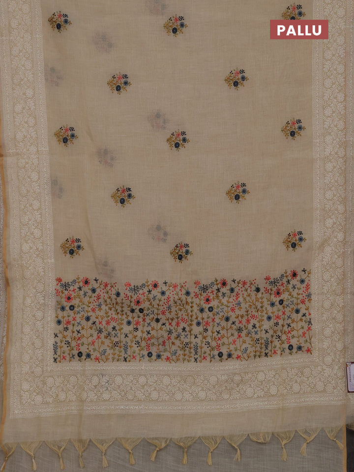 Linen cotton saree cream with embroidery buttas and embroidery pallu