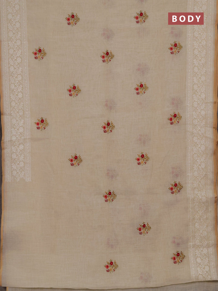 Linen cotton saree cream with embroidery buttas and embroidery pallu