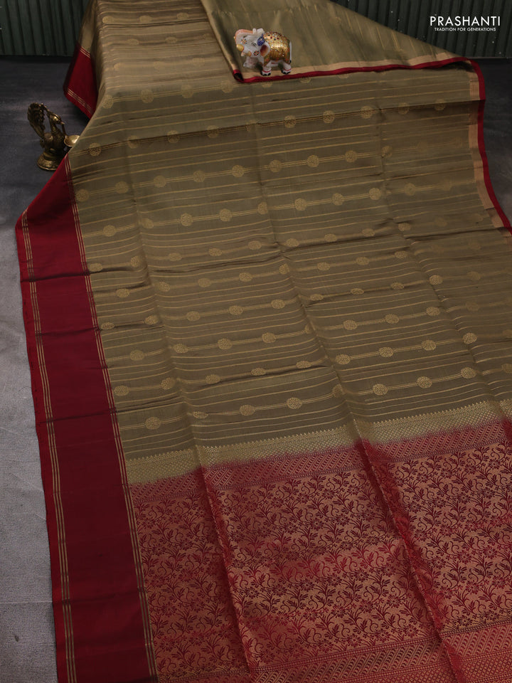Pure soft silk saree olive green and red with allover zari stripes & buttas and rettapet zari woven border