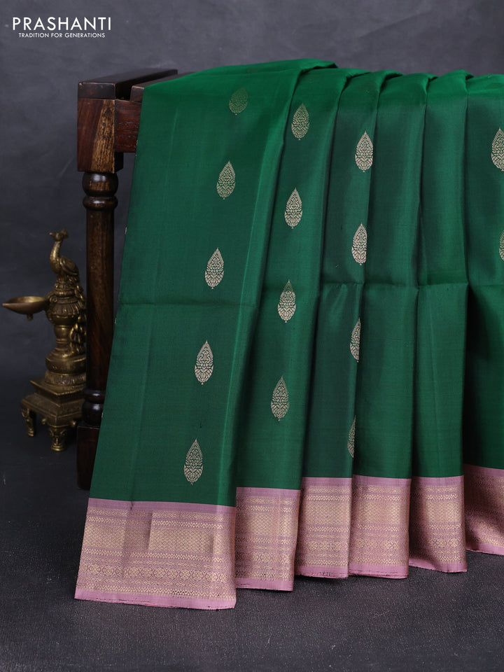 Pure soft silk saree dark green and peach pink with allover zari woven buttas and zari woven border