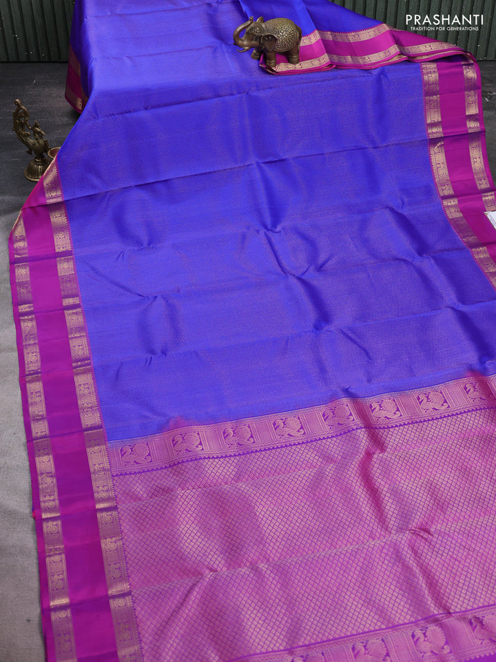 Pure soft silk saree royal blue and purple with allover zari woven brocade weaves and rettapet zari woven border