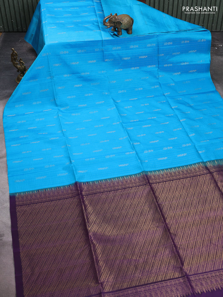 Pure soft silk saree cs blue and purple with allover checked pattern & zari buttas in borderless style