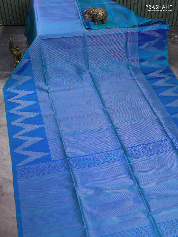 Pure soft silk saree dual shade of bluish green with allover silver zari woven brocade weaves and temple design silver zari woven border