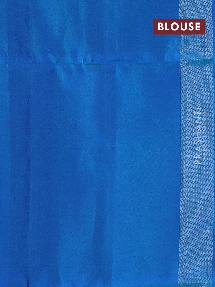 Pure soft silk saree dual shade of bluish green with allover silver zari woven brocade weaves and temple design silver zari woven border