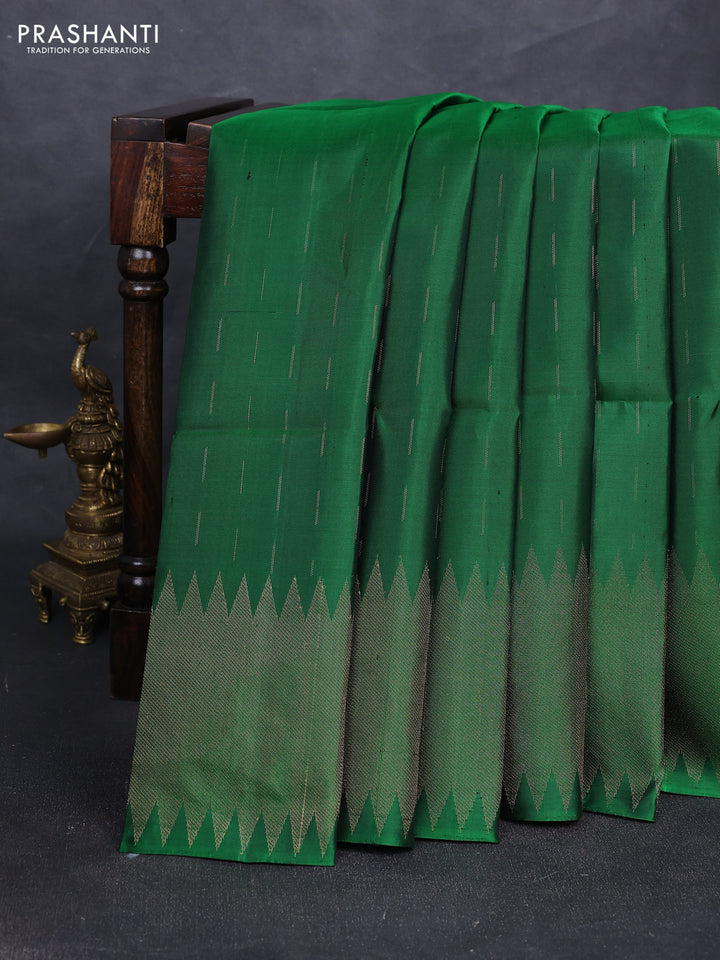 Pure soft silk saree green with allover zari woven buttas and zari woven border