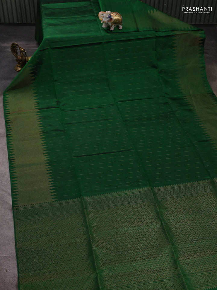 Pure soft silk saree green with allover zari woven buttas and zari woven border