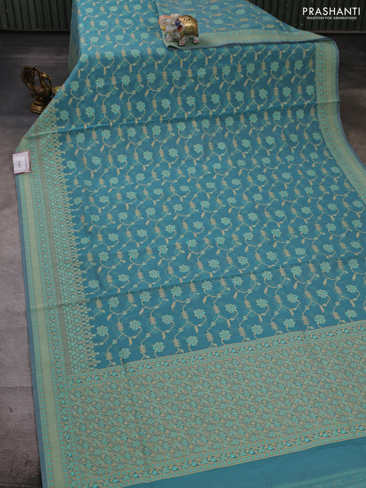 Banarasi cotton saree teal blue with allover thread weaves and woven border