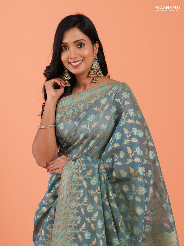 Banarasi cotton saree dual shade of teal blue with allover thread weaves and woven border