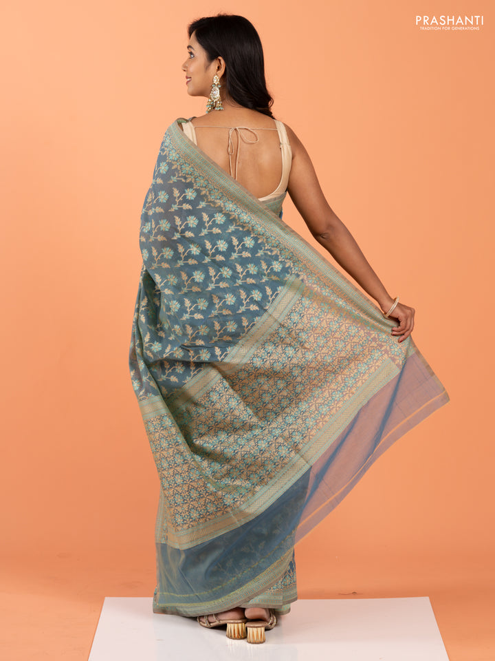 Banarasi cotton saree dual shade of teal blue with allover thread weaves and woven border