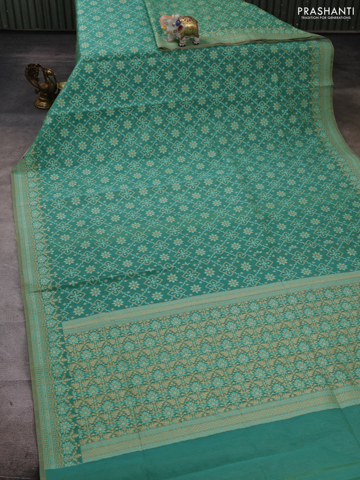 Banarasi cotton saree teal green with allover thread weaves and woven border