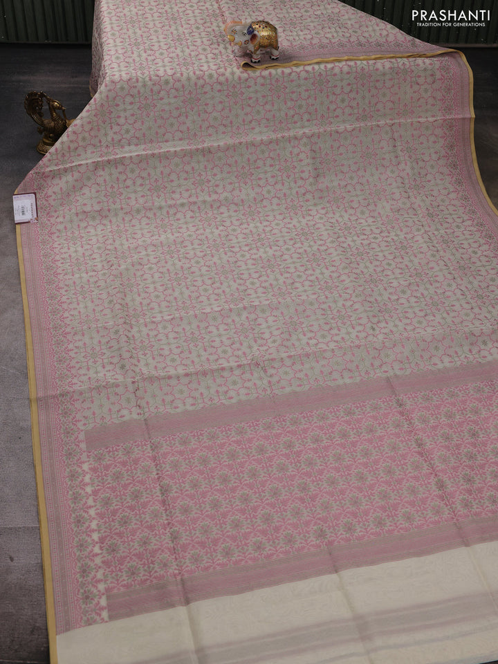Banarasi cotton saree cream with allover thread weaves and woven border
