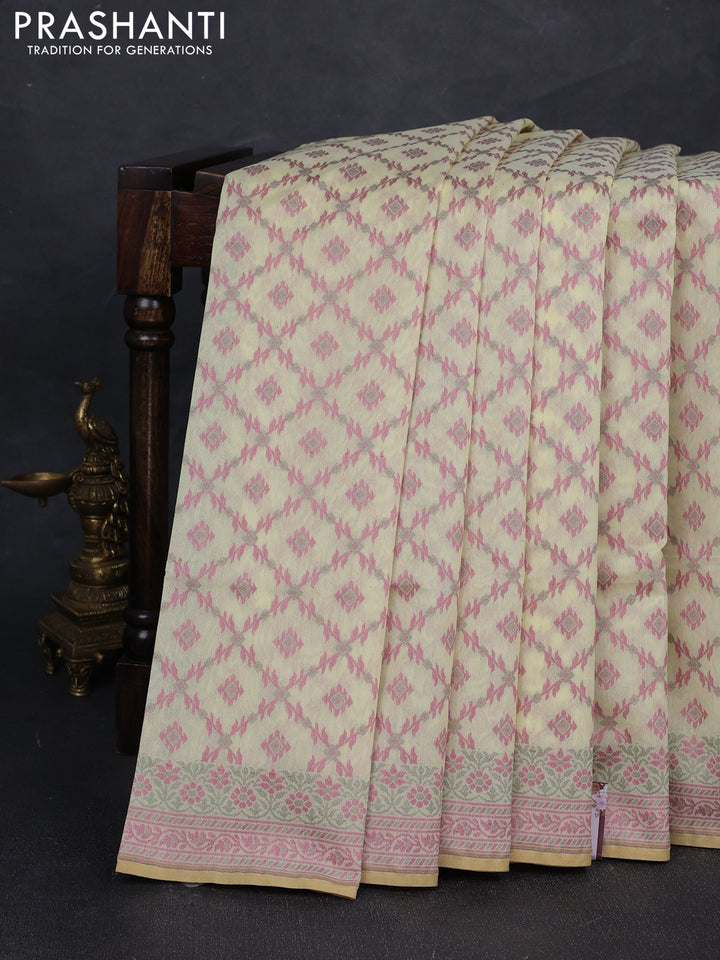 Banarasi cotton saree pale yellow with allover thread weaves and woven border