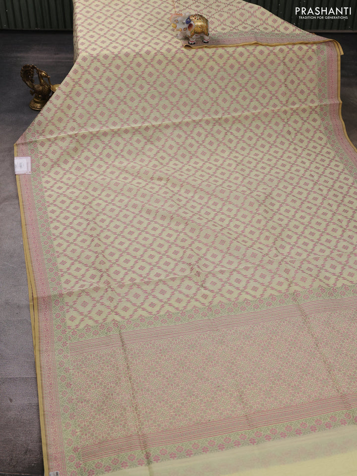 Banarasi cotton saree pale yellow with allover thread weaves and woven border