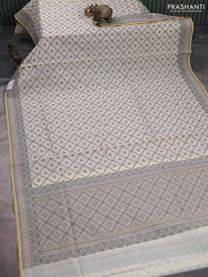 Banarasi cotton saree off white and brown with allover thread weaves and woven border