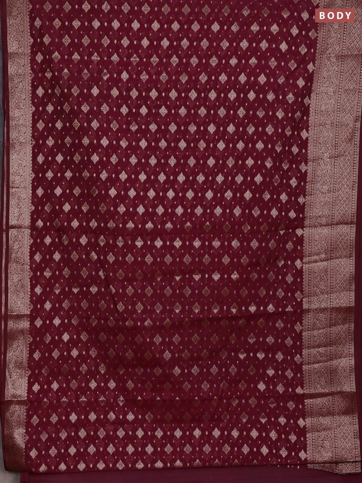 Semi chiniya silk saree wine shade with allover thread & zari woven buttas and woven border