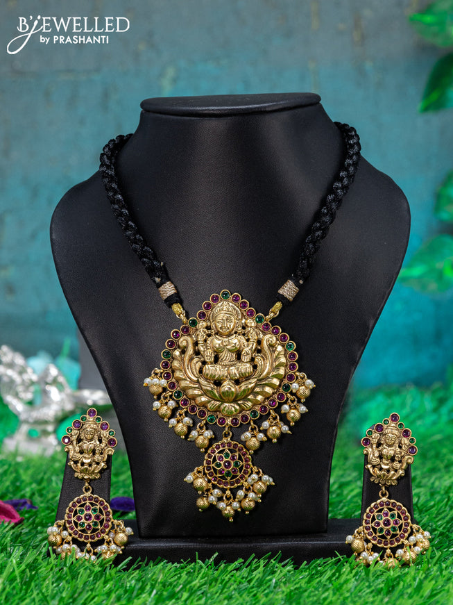 Black thread necklace with lakshmi pendant & kemp stone and beads hanging