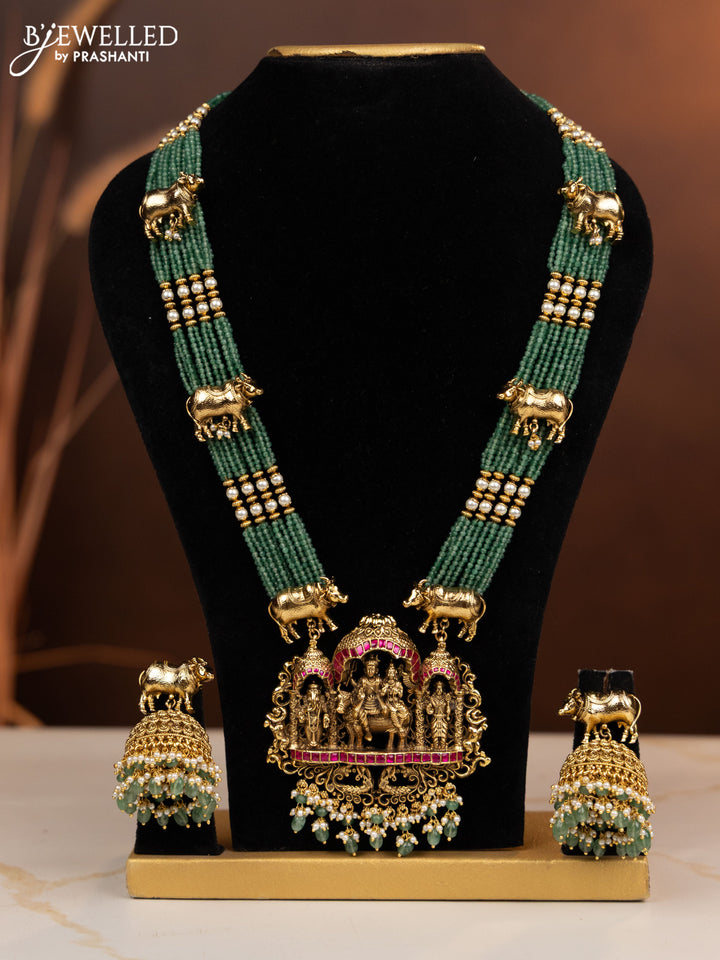 Antique beaded haaram shivan parvathi pendant with ruby and pink jadau stones in pearl & mint green beads hangings