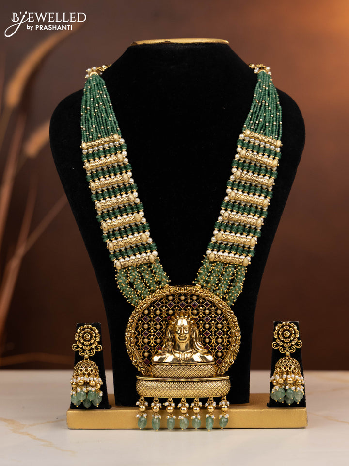 Antique beaded haaram shivan pendant with ruby stones in mint green & golden beads hangings