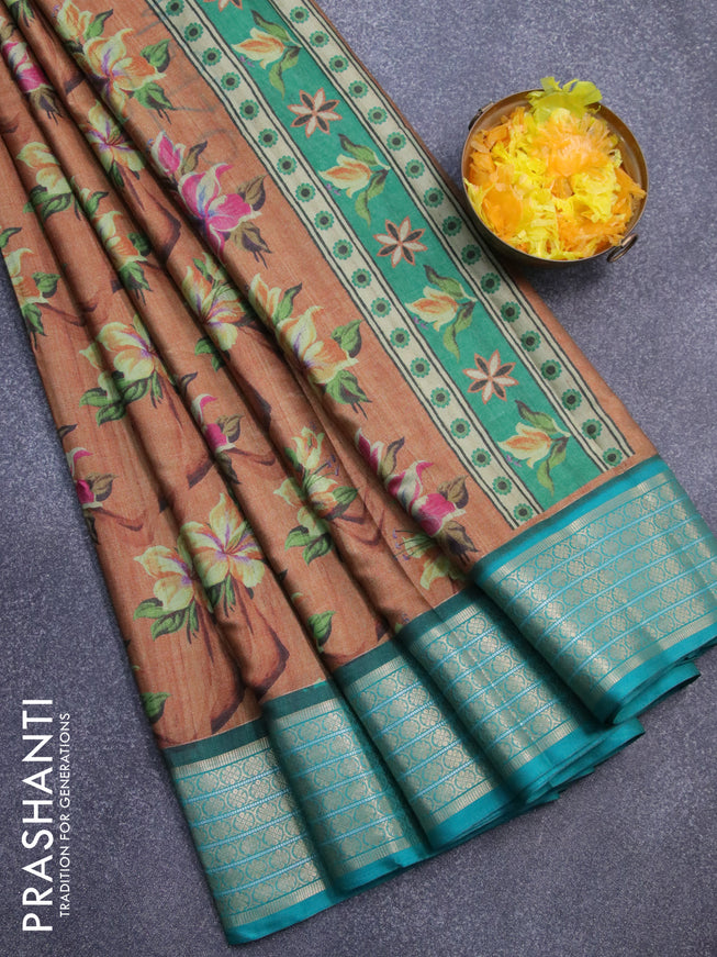 Semi kanjivaram silk saree rust shade and teal green with allover floral digital prints and zari woven border