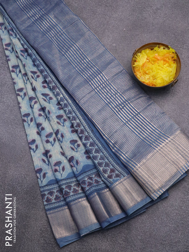 Semi gadwal saree pastel blue with allover floral butta prints and zari woven border