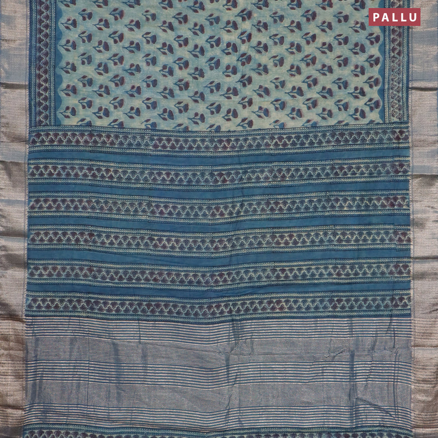 Semi gadwal saree pastel shade of blue with allover floral butta prints and zari woven border