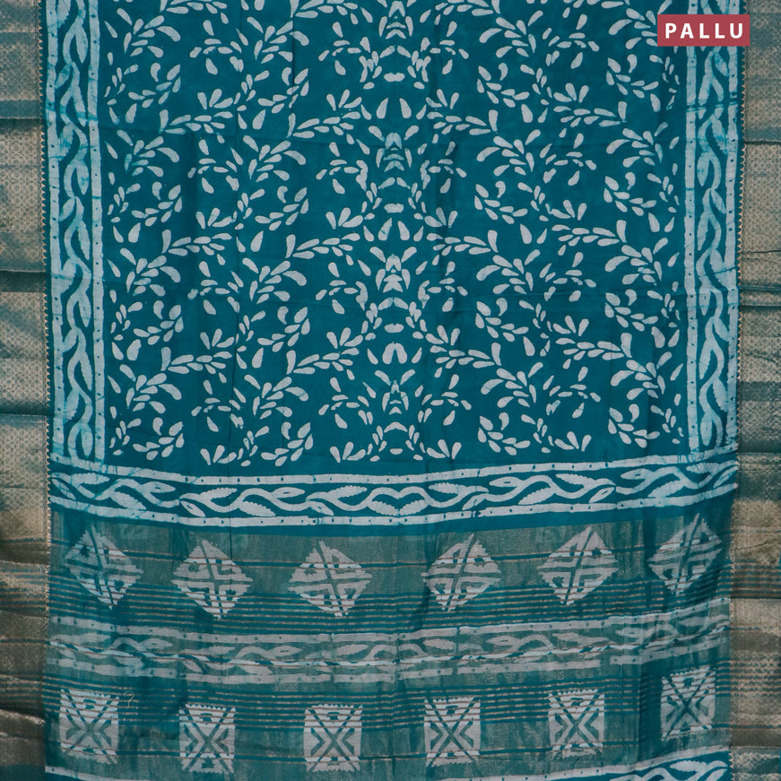 Semi gadwal saree teal green with allover batik prints and zari woven border