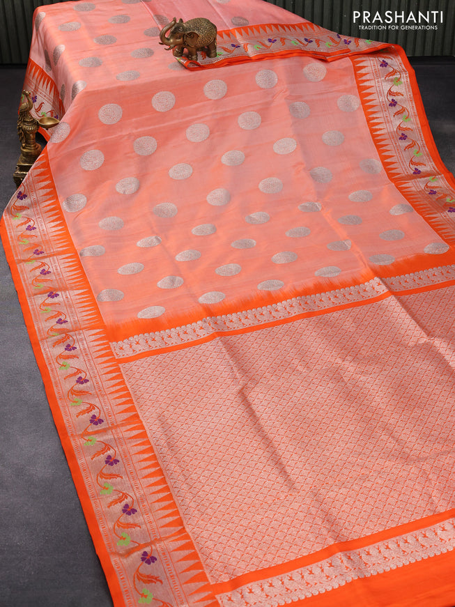 Venkatagiri silk saree orange shade and orange with silver zari woven buttas and temple design silver zari woven floral paithani border
