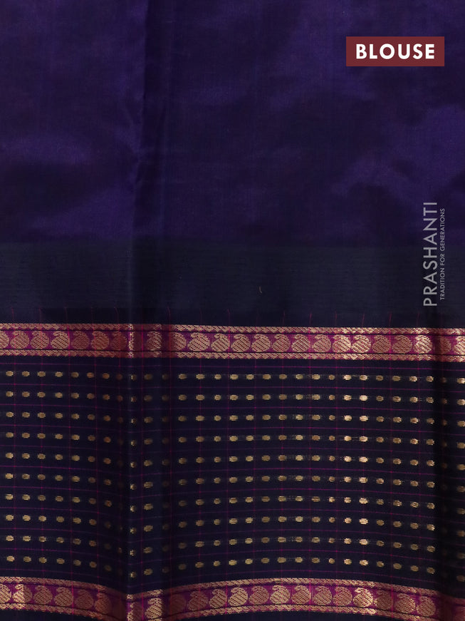 Kuppadam silk cotton saree dual shade of peach pink and navy blue with allover zari woven buttas and temple design paisley zari woven border