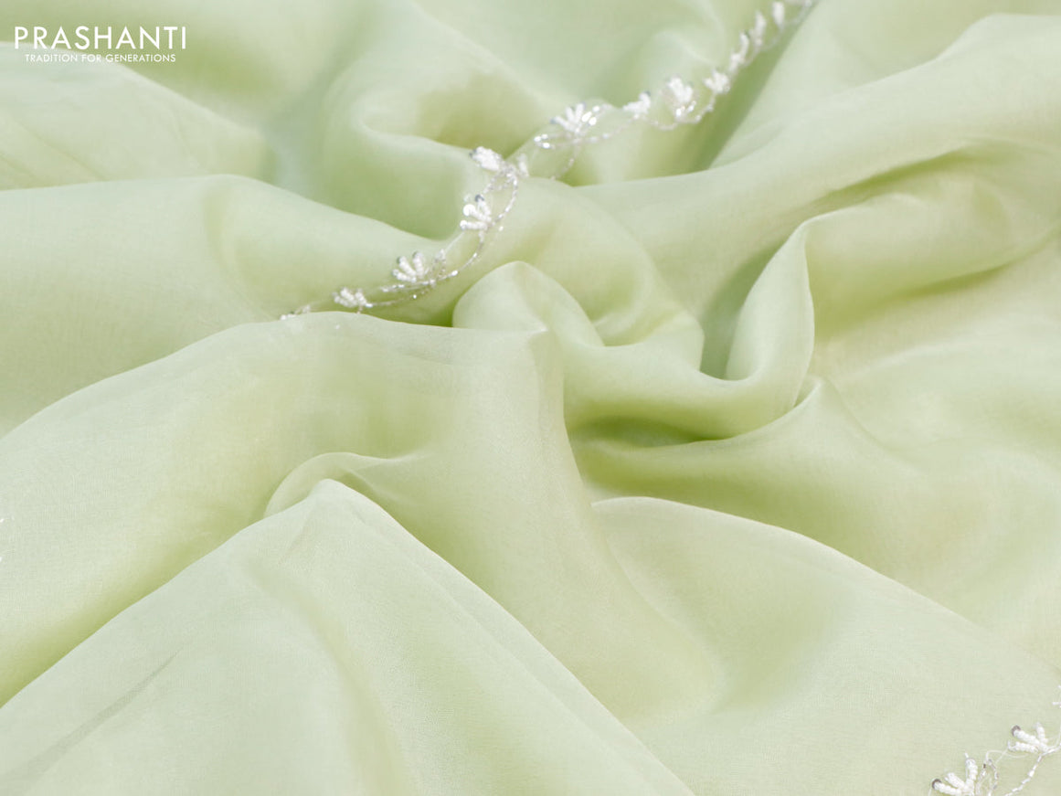 Organza silk saree pista green with allover beaded work and zardosi work border & embroidery work readymade blouse
