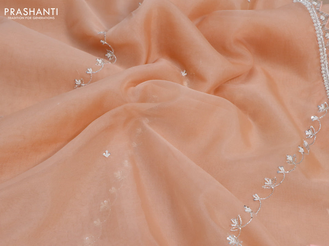 Organza silk saree peach shade with allover beaded work and zardosi work border & embroidery work readymade blouse