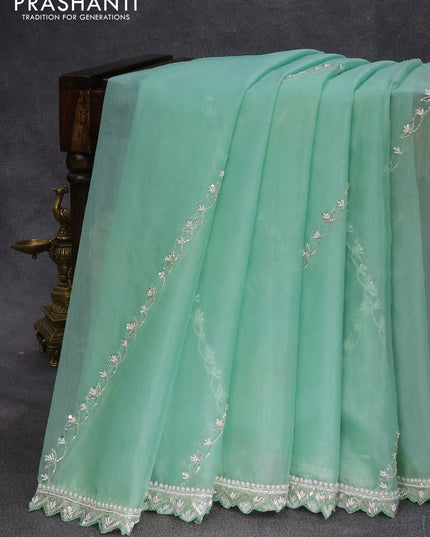 Organza silk saree teal green shade with allover beaded work and zardosi work border & embroidery work readymade blouse