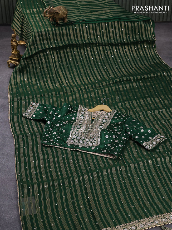 Organza silk saree green with allover zari woven stripes pattern & mirror work and gottapatti lace work border & embroidery work readymade blouse