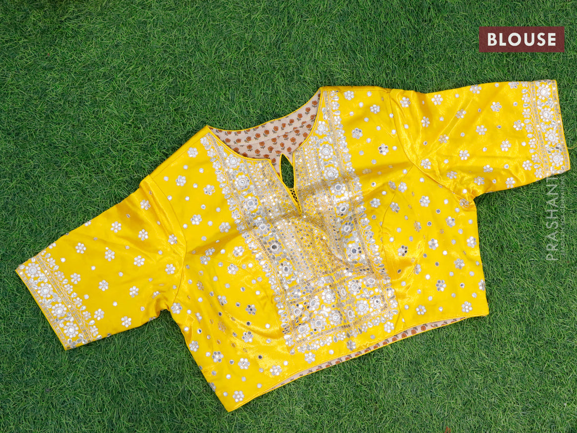 Organza silk saree mango yellow with allover zari woven stripes pattern & mirror work and gottapatti lace work border & embroidery work readymade blouse