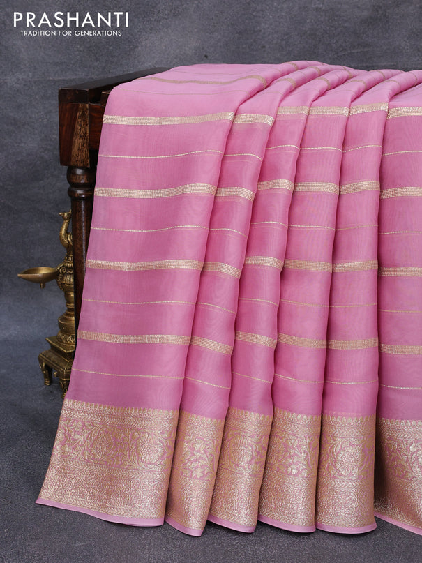 Organza silk saree pastel pink with allover zari woven stripes pattern and zari woven border & embroidery work readymade blouse