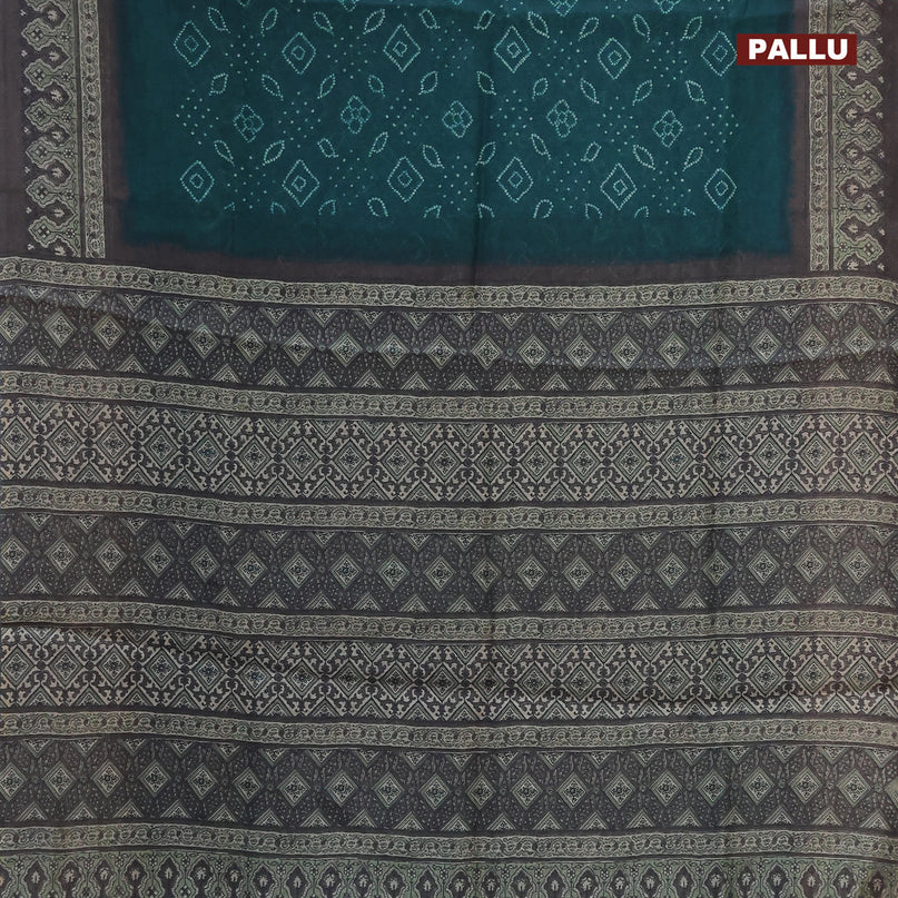 Semi linen saree green and grey shade with allover bandhani prints and ajrakh printed pallu