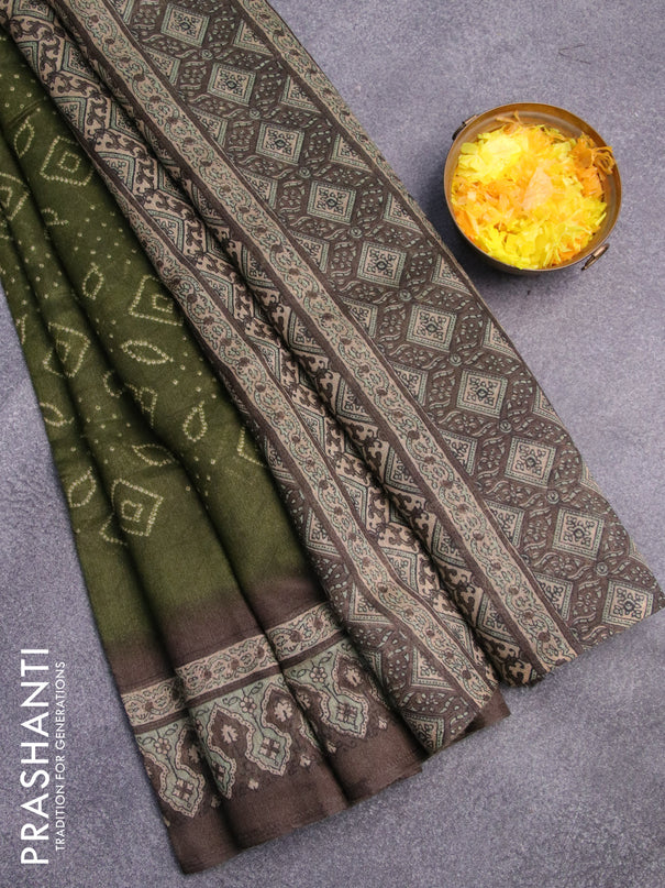 Semi linen saree sap green and dark grey with allover bandhani prints and ajrakh printed pallu