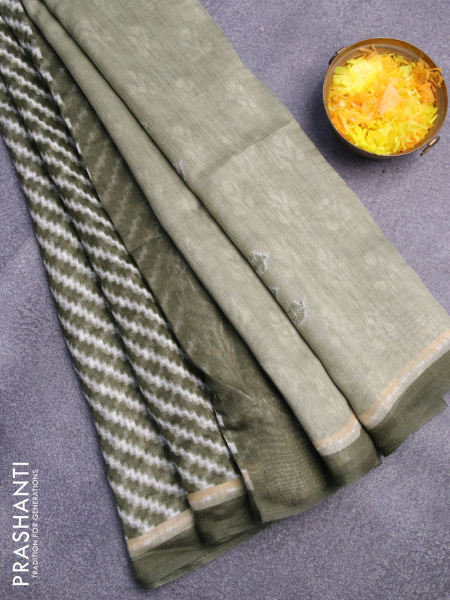 Semi linen saree sap green with allover stripes pattern and simple border
