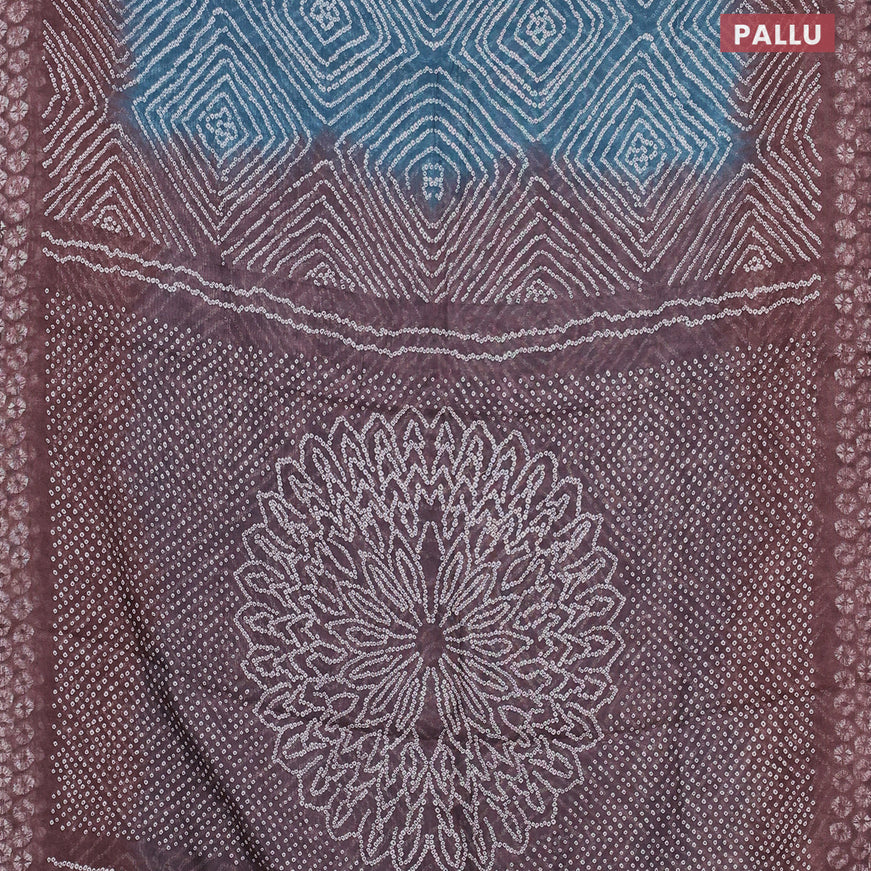 Semi linen saree blue and coffee brown with allover bandhani prints and batik printed border