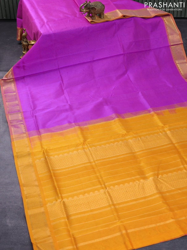 Silk cotton saree purple shade and mustard yellow with plain body and zari woven border