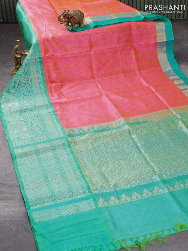 Kuppadam silk cotton saree dual shade of pinkish yellow and teal blue with allover zari woven buttas and long rich zari woven border - {{ collection.title }} by Prashanti Sarees