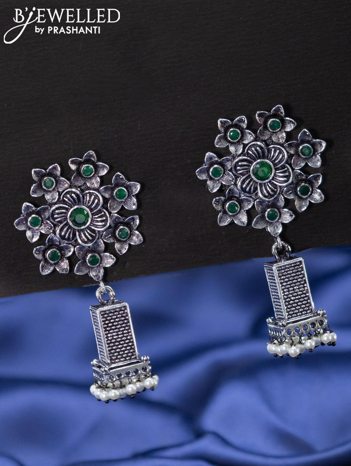 Oxidised jhumkas floral design with emerald stones