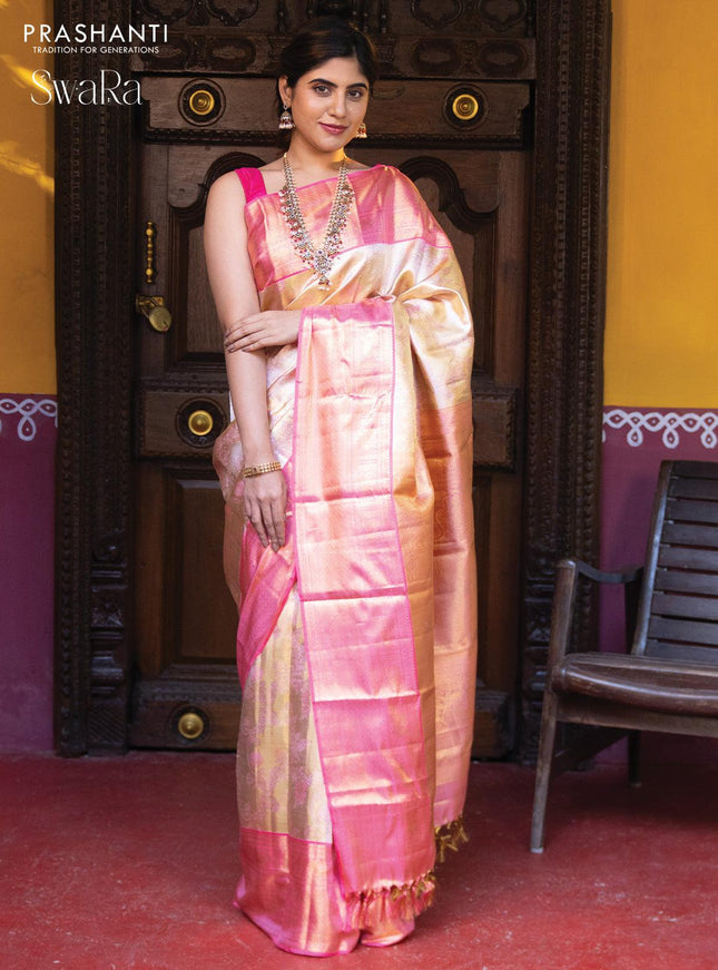 Pure kanjivaram tissue silk saree cream and light pink with allover zari woven brocade weaves and zari woven border