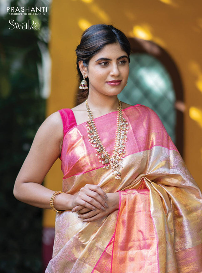 Pure kanjivaram tissue silk saree cream and light pink with allover zari woven brocade weaves and zari woven border